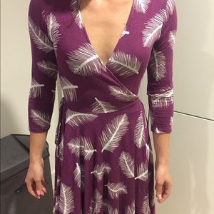 Hourglass Lilly wrap dress with feather print